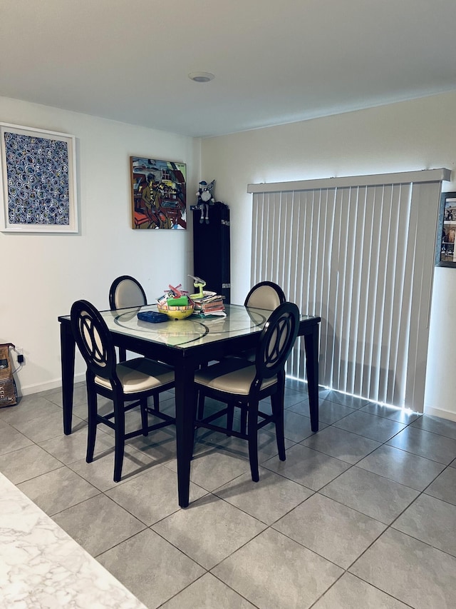 dining room with light tile patterned floors