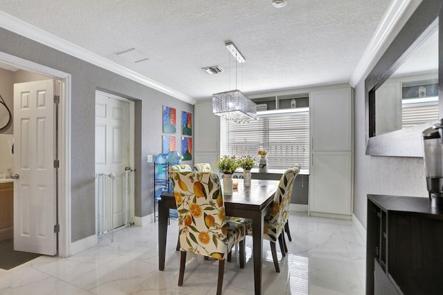 dining space featuring a textured ceiling, a notable chandelier, and ornamental molding