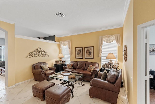 living room featuring crown molding and light tile patterned flooring