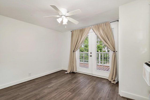 empty room with french doors, dark hardwood / wood-style flooring, and ceiling fan