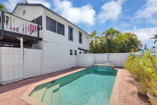 view of pool featuring a hot tub