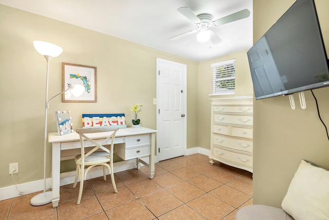 office space with ceiling fan and light tile patterned floors