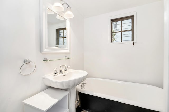 bathroom featuring a tub