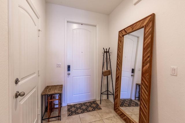 entryway featuring light tile patterned floors