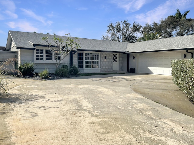 single story home with a garage