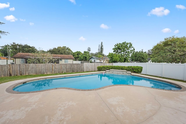 view of swimming pool featuring a patio