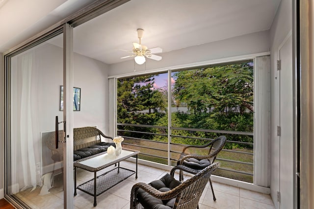 sunroom / solarium with ceiling fan