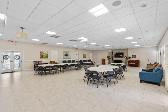 dining space featuring a paneled ceiling