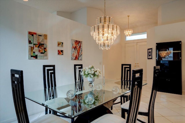 dining room featuring an inviting chandelier and light tile patterned flooring