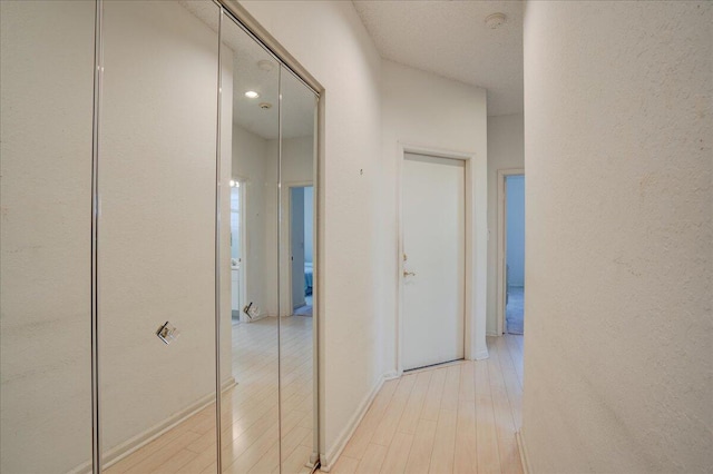 hall featuring light wood-type flooring