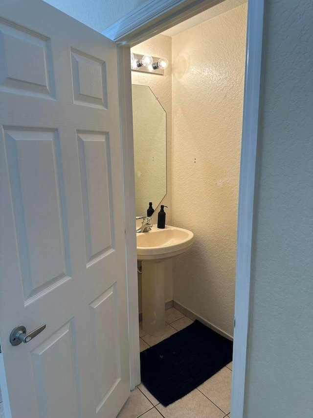 bathroom featuring tile patterned flooring