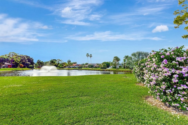 view of yard with a water view