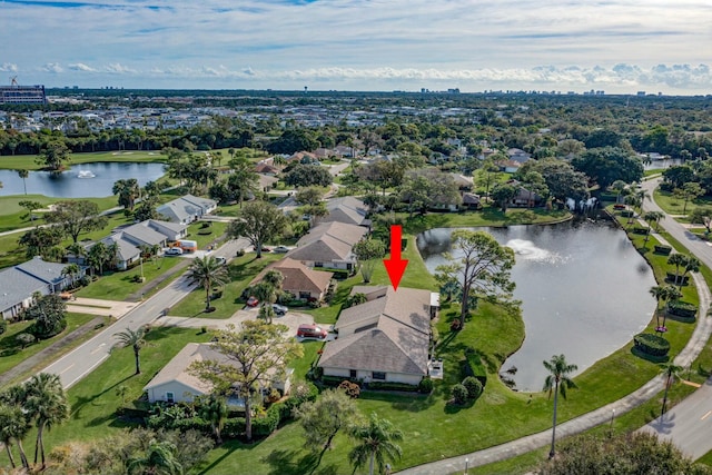 drone / aerial view featuring a water view