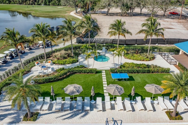 birds eye view of property featuring a water view