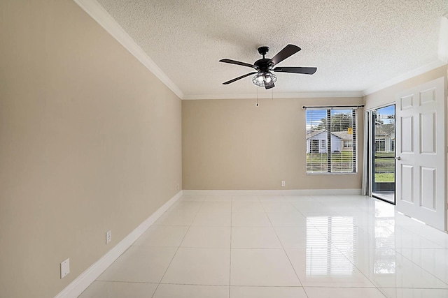 tiled empty room with ceiling fan, ornamental molding, and a textured ceiling