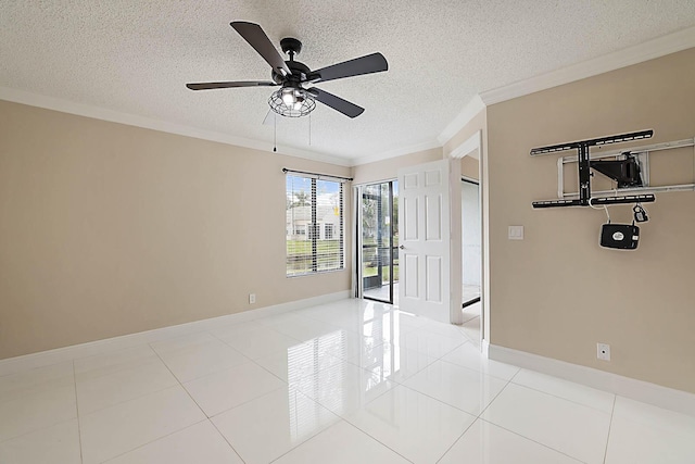 tiled empty room with crown molding, ceiling fan, and a textured ceiling