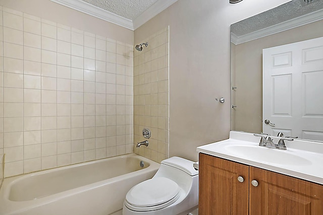 full bathroom with tiled shower / bath, vanity, toilet, crown molding, and a textured ceiling