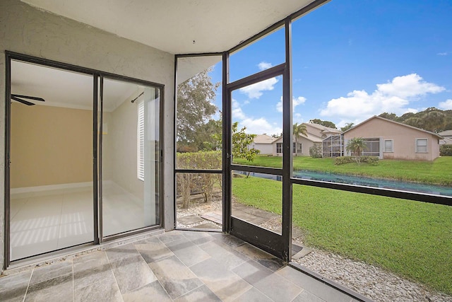 unfurnished sunroom featuring a wealth of natural light