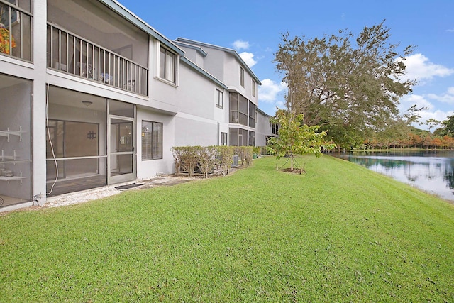 view of yard featuring a water view