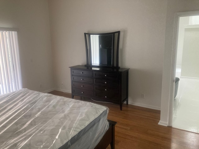 bedroom featuring hardwood / wood-style floors