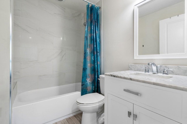 full bathroom featuring vanity, a textured ceiling, shower / bathtub combination with curtain, hardwood / wood-style floors, and toilet