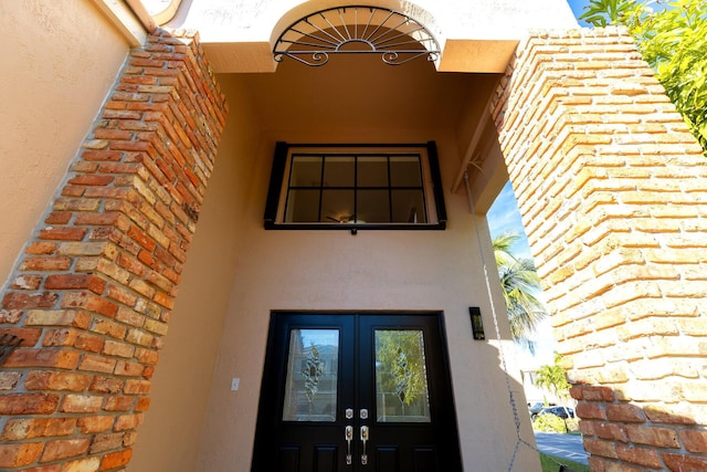 doorway to property with french doors