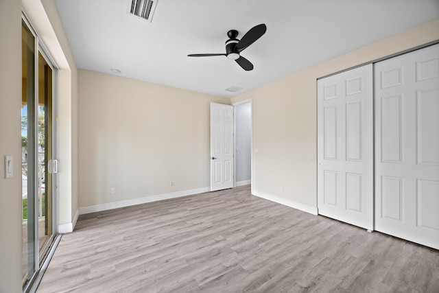 unfurnished bedroom with access to outside, ceiling fan, and light hardwood / wood-style floors