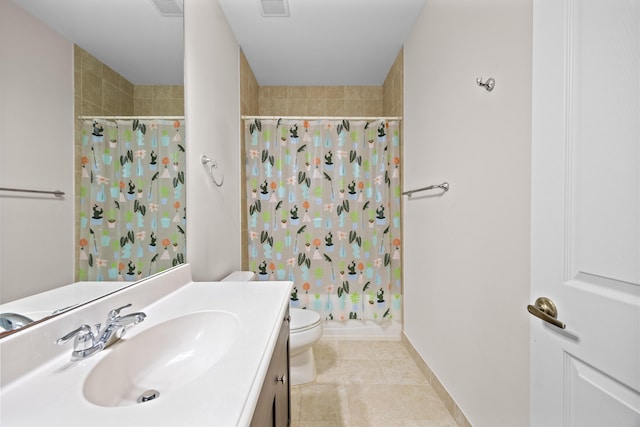 full bathroom featuring tile patterned flooring, vanity, toilet, and shower / tub combo