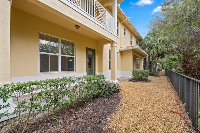 view of property exterior featuring a balcony