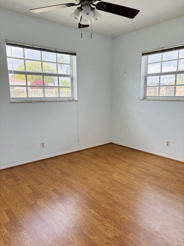 spare room with light wood-type flooring