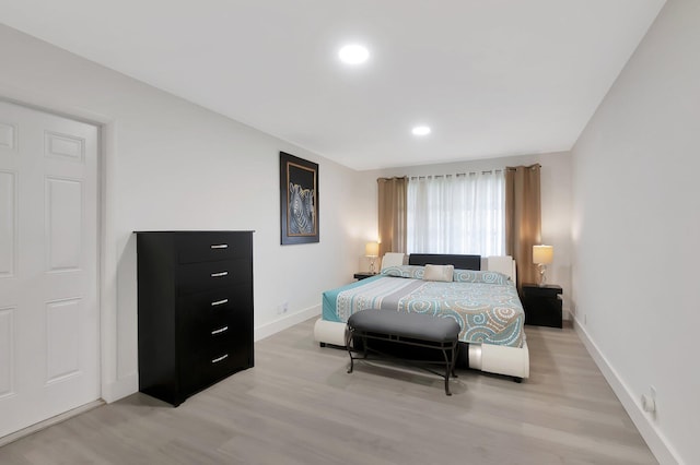 bedroom featuring light hardwood / wood-style floors