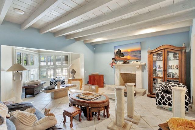 living room featuring light tile patterned floors, a fireplace, wood ceiling, and beam ceiling