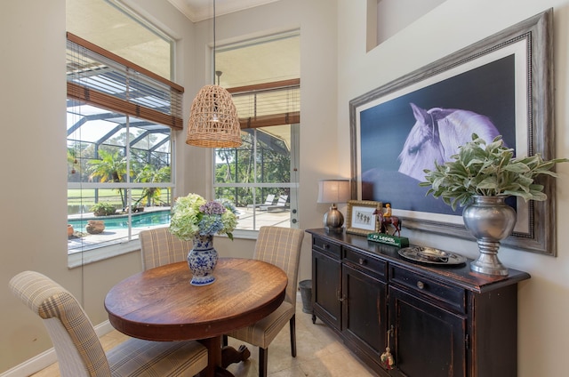 dining space featuring light tile patterned floors