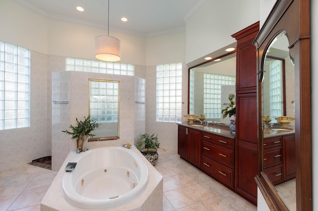 bathroom with vanity, tile patterned flooring, crown molding, and a healthy amount of sunlight