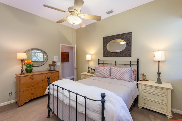 bedroom with light colored carpet and ceiling fan