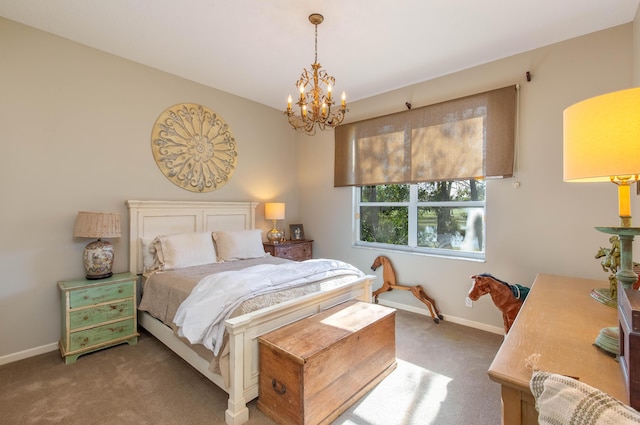 bedroom with a chandelier and dark carpet