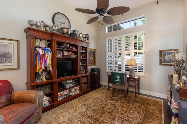 interior space featuring ceiling fan