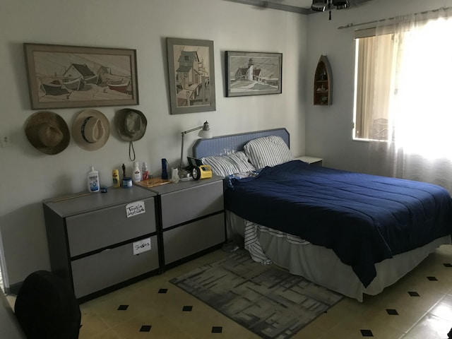 bedroom with light tile patterned flooring