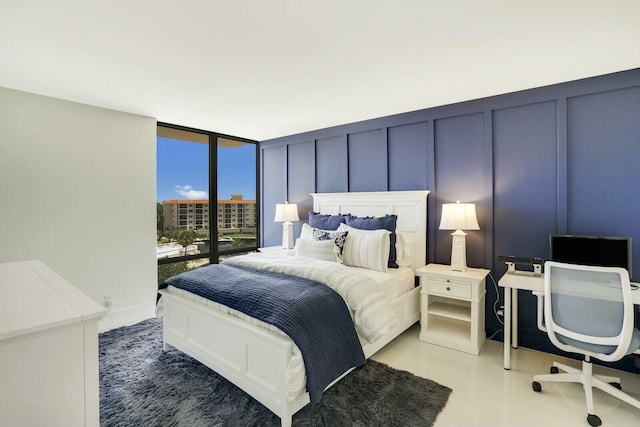 bedroom with expansive windows