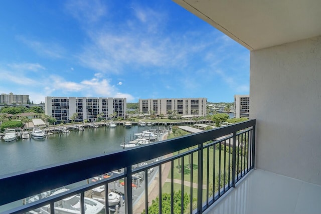 balcony featuring a water view