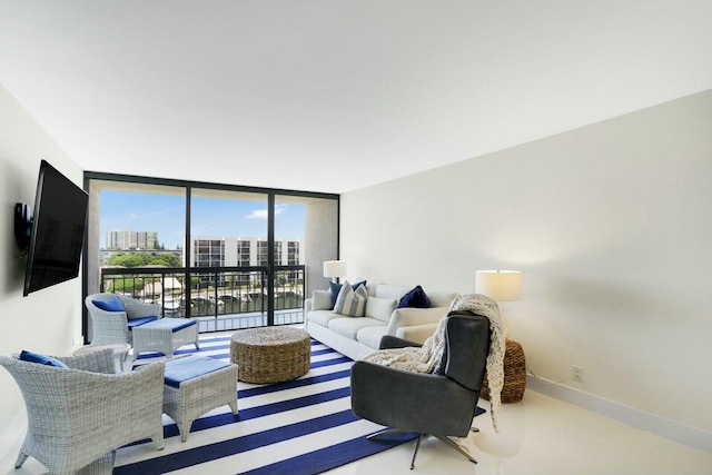 living room with floor to ceiling windows