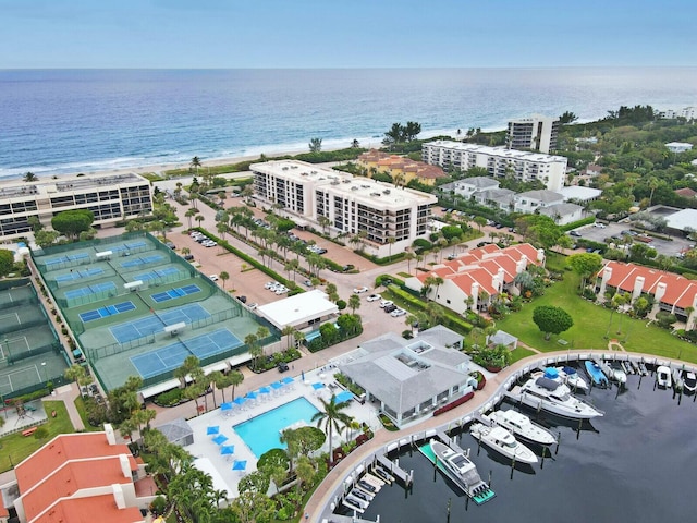 birds eye view of property featuring a water view