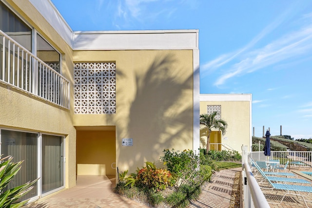 view of property exterior with a balcony