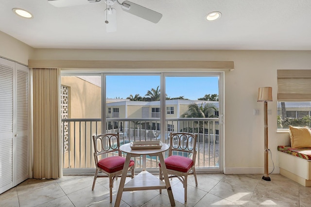 interior space featuring a wealth of natural light and ceiling fan