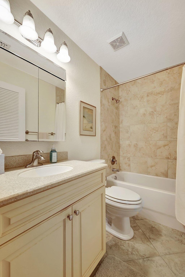 full bathroom with shower / tub combo, vanity, a textured ceiling, and toilet