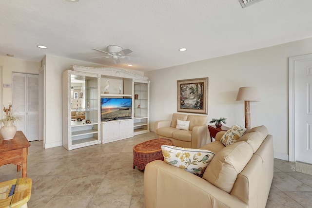 living room featuring ceiling fan