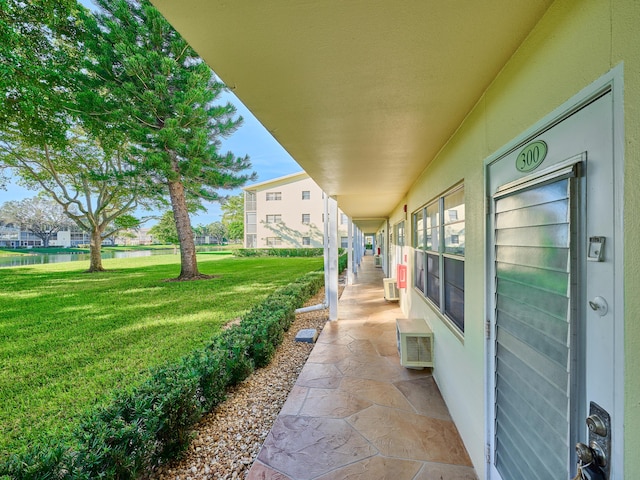 exterior space featuring a wall mounted air conditioner