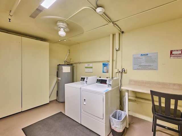 clothes washing area with water heater, ceiling fan, and washer and dryer