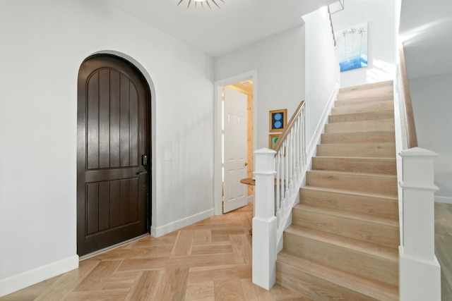 entryway featuring light parquet floors