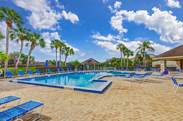 view of swimming pool with a patio area